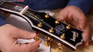 A Guitar Builder Looks at a Chinese made FAKE Gibson Supreme Chibson Guitar [upl. by Eeima]