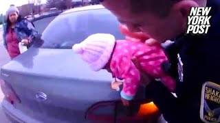 Officers save the life of a choking baby  New York Post [upl. by Amoreta436]