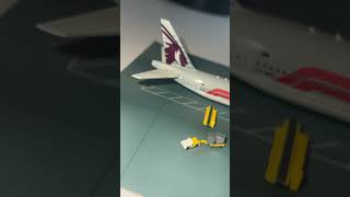 Phoenix Models Qatar Airways B777300ER A7BEL quotF1quot PH4QTR2443 1400 Scale qatarairways b777300er [upl. by Arreit]