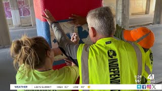 Sheffield neighborhood volunteers spruce up paint clean up litter at 9th amp Hardesty underpass mural [upl. by Elletnohs]