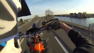 Ktm 525 SX Supermoto full akrapovic titanium exhaust some wheelie practice [upl. by Ellah]