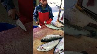 Spectacular cleaning of trout at the fish market [upl. by Lleret385]