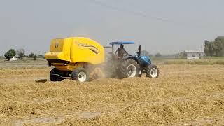 New Holland Workmaster 105 with RB 150 Round Baler workmaster105 newhollandagriculture [upl. by Okajima]