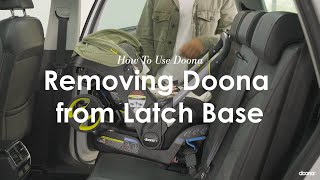 How to remove Doona  from LATCH base  Doona  Car Seat amp Stroller [upl. by Ellehcam]