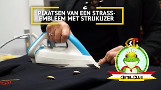 Strasembleem plaatsen met een strijkijzer op uniformjasje Oetelclubnl [upl. by Aronson]