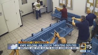 Homeless man with knives Tased at MCSO jail [upl. by Yelahc937]