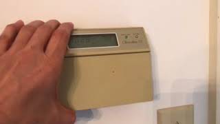 Honeywell chronotherm III thermostat How to change the batteries [upl. by Lerud]