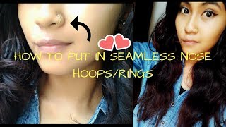 HOW TO PUT IN SEAMLESS NOSE HOOPRINGS [upl. by Panther]