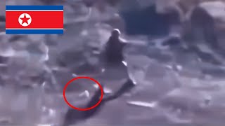 North Korean Soldier Knocks Down Drone But Then Walk Up To It And [upl. by Ayaet303]