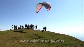 Man parasailing under blue sky [upl. by Newton]