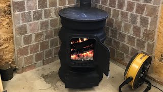 Building a wood burning stove from semi rims [upl. by Adnovad]