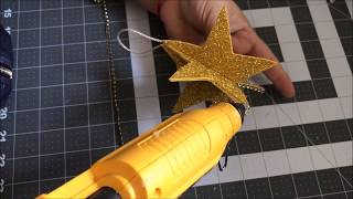 Como hacer una estrella para arbol navideñoHow to make a star for the christmas tree [upl. by Donielle]