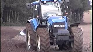 New Holland TM120 and TM150 ploughing [upl. by Ronyar]