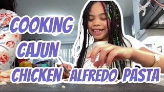 Cooking Cajun Chicken Alfredo Pasta [upl. by Penthea]