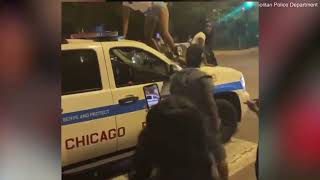 Women are filmed twerking on top of a cop car in Chicago [upl. by Ensoll]