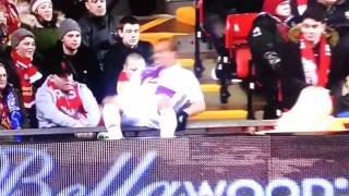 Liverpool fan sees Gabby Agbonlahor fall over avdertising hoardings whips out his camera [upl. by Nedak]