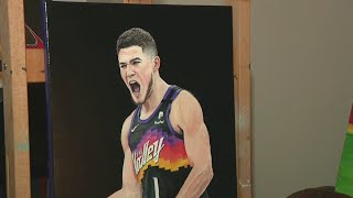 Gilbert artist creates impressive Devin Booker painting [upl. by Esaertal]