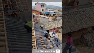 The Process Of Installing Tiles On The Roof [upl. by Ahseikram]