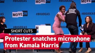 Watch this animalrights protester snatch a microphone from Kamala Harris [upl. by Sasha]