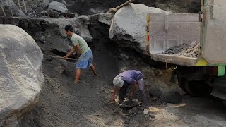 Transporting gravel to be ground into stone ash [upl. by Rodolph]