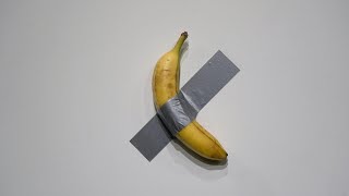 Banana taped to a wall sells for 62 mn in New York [upl. by Madelena]