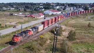 Awesome Aerial 4K View Long Extra Stack Train CN 123 heading out of Amherst NS [upl. by Ramhaj]