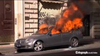 Protesters in Rome burn cars break windows [upl. by Adnuhs]