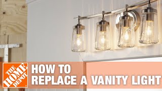 Bathroom Lighting  How to Replace a Vanity Light  The Home Depot [upl. by Seften]