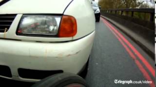 Cyclist captures road rage with helmet cam [upl. by Dadirac]