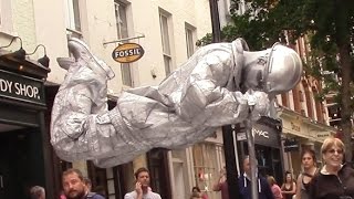 Silver man secret revealed London street performer floating and levitating trick [upl. by Maxwell]