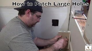 How to Patch Large Holes in Sheetrock [upl. by Romelle]