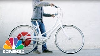 This Robotic Bike Wheel Will Disrupt The Urban Commute  CNBC [upl. by Yrolg]