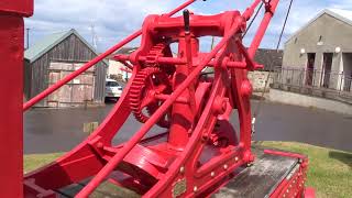 The magnificent restored historic 1856 harbour crane at Hopeman Harbour Moray Scotland [upl. by Snowber]