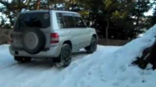 pajero io in wet snowmp4 [upl. by Schuler]