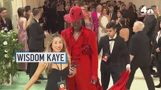 Model Wisdom Kaye sports headtotoe red at 2024 Met Gala  NBC New York [upl. by Sims]