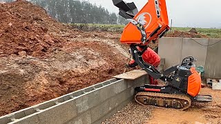 Stützwand aus Betonschalsteine mauern und betonieren Gabionenkörbe setzen Drainage herstellen [upl. by Ahsitel]