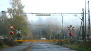 SJTransitio KtK KusttillKust train on a foggy morning at Badstrandsvägen level crossing [upl. by Limoli]