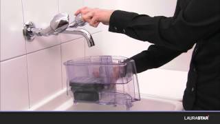 Laurastar  How to fill the water filter with antiscale granules [upl. by Zed]