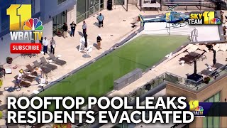 Baltimore rooftop pool leaks residents evacuated [upl. by Hachmann215]