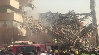 Many Iran firefighters feared trapped in building collapse [upl. by Selima353]