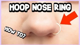 HOW TO PUT IN A HOOP NOSE RING  HELPFUL TRICK [upl. by Gonyea540]