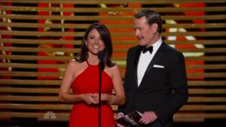 Bryan Cranston plants a passionate kiss on Julia LouisDreyfus at Emmy awards [upl. by Aicirtel]