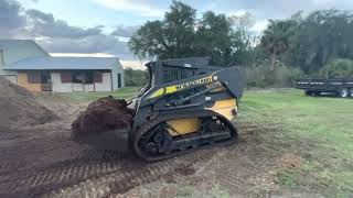 New Holland L185 wheeled skid steer with Loegering tracks [upl. by Landers820]