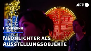 Hongkongs Neonlichter ziehen um  AFP [upl. by Mintun]