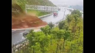 Shandong China  July 29 2024  landslide suddenly occurred on a highway nearly hitting a car [upl. by Erdeid]