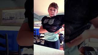 How to put shoulder pads on football [upl. by Bobby978]