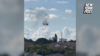 Airrescue helicopter crashes into Florida apartment building [upl. by Acinelav]