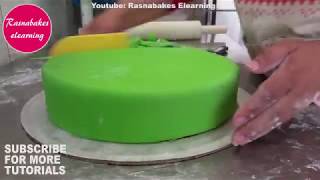 how to cover a chocolate cake with fondantCake Decorating classes [upl. by Zared]