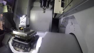 Makino DA300 5Axis Vertical Mill IMTS 2016 Pallet Loading Demo [upl. by Eyla]