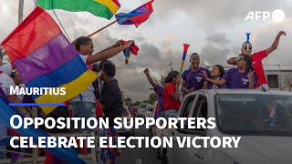 Mauritius opposition supporters celebrate an expected election victory  AFP [upl. by Phineas]